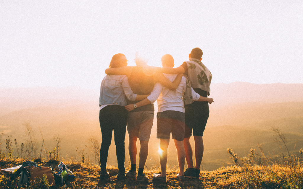 love-one-another youth with Bibles